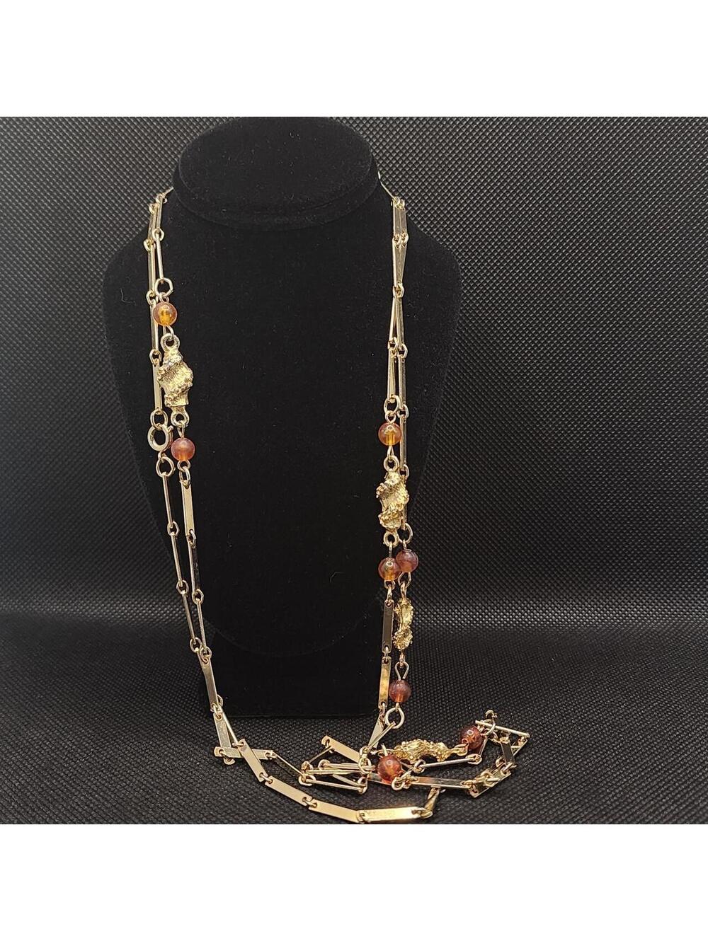 Unique gold tone necklace